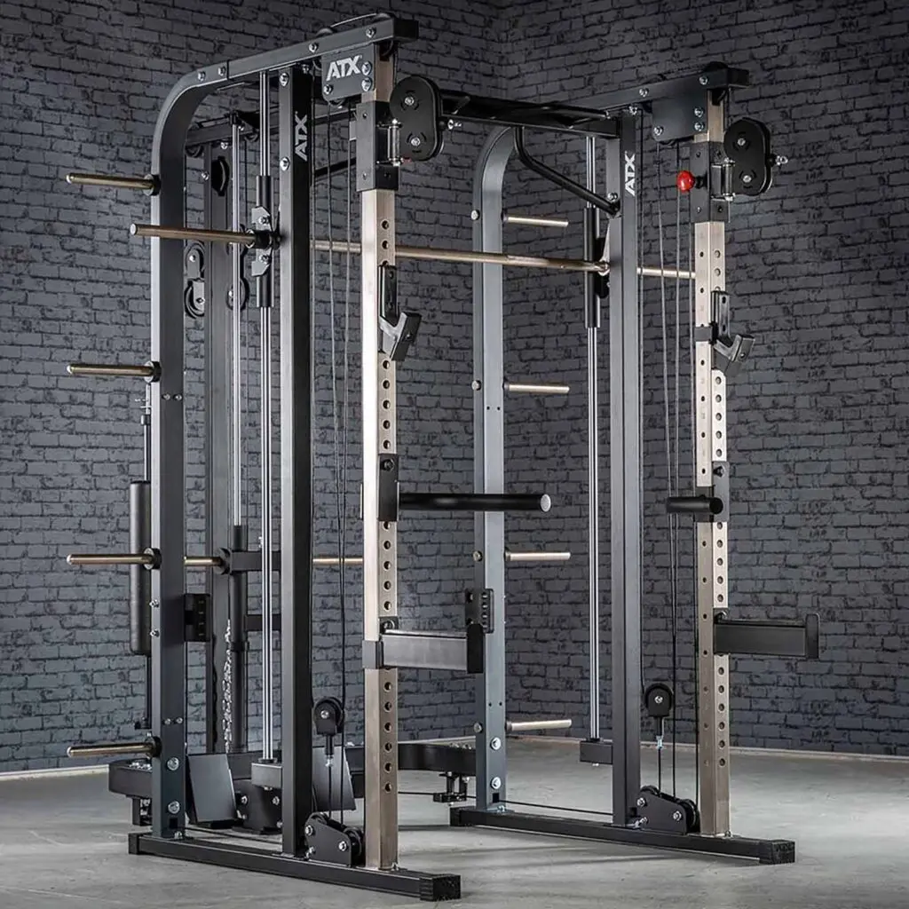 A multi-functional gym machine set against a brick wall. It includes a power rack, cable system, and various attachments designed for strength training exercises in a home or commercial gym setting.
