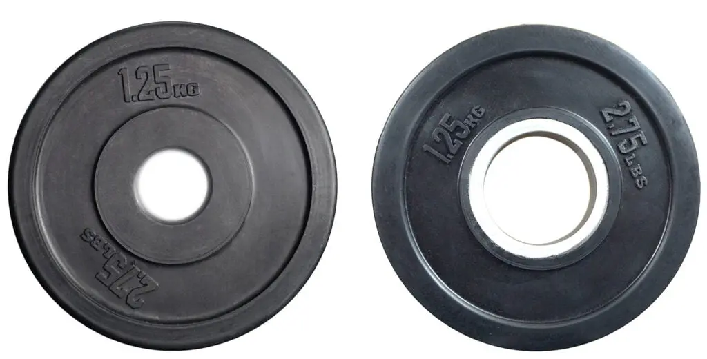 A standard 1.25kg plate compared to an Olympic 1.25kg weight plate
