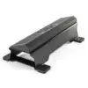 The ATX® Calf Block is a black metal ramp with grooved details and flat, wide feet for stability. It is slightly elevated at the center, offering heavy-duty support, making it perfect for use with vehicles or equipment.
