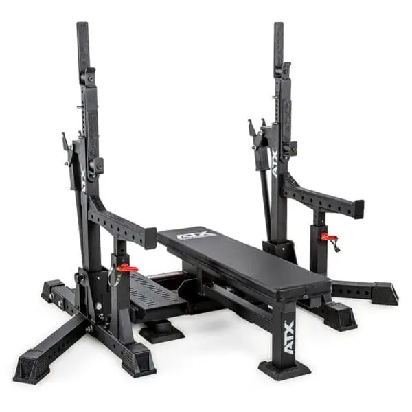 The ATX® Competition Combo Rack is a black adjustable weightlifting bench with dual squat racks, durable construction, safety pins, and customizable settings, featuring the ATX brand logo.