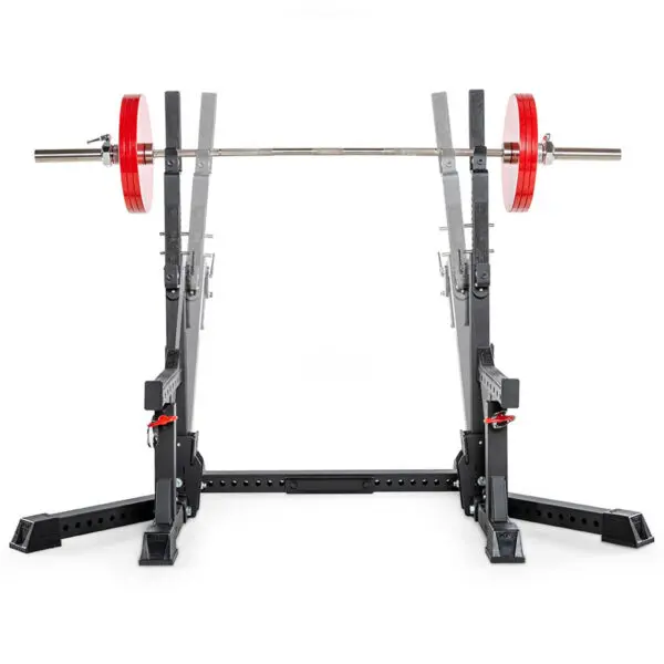 The ATX® Competition Combo Rack holds a loaded barbell with red weight plates. This sturdy, adjustable rack is ideal for weightlifting exercises, set against a white background to highlight the gym equipment.