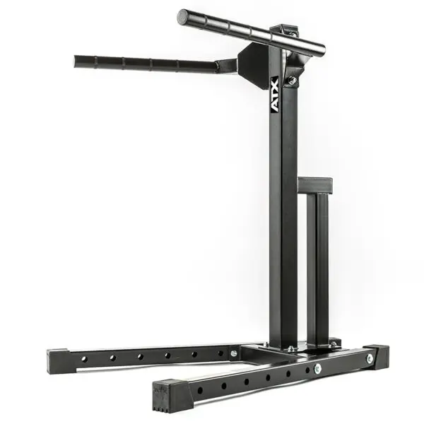 The ATX® Dip Station is a black exercise machine with a sturdy frame and adjustable height settings, perfect for upper body workouts. It includes parallel bars and a stable base with rubber foot caps, making it ideal for both home and gym environments.