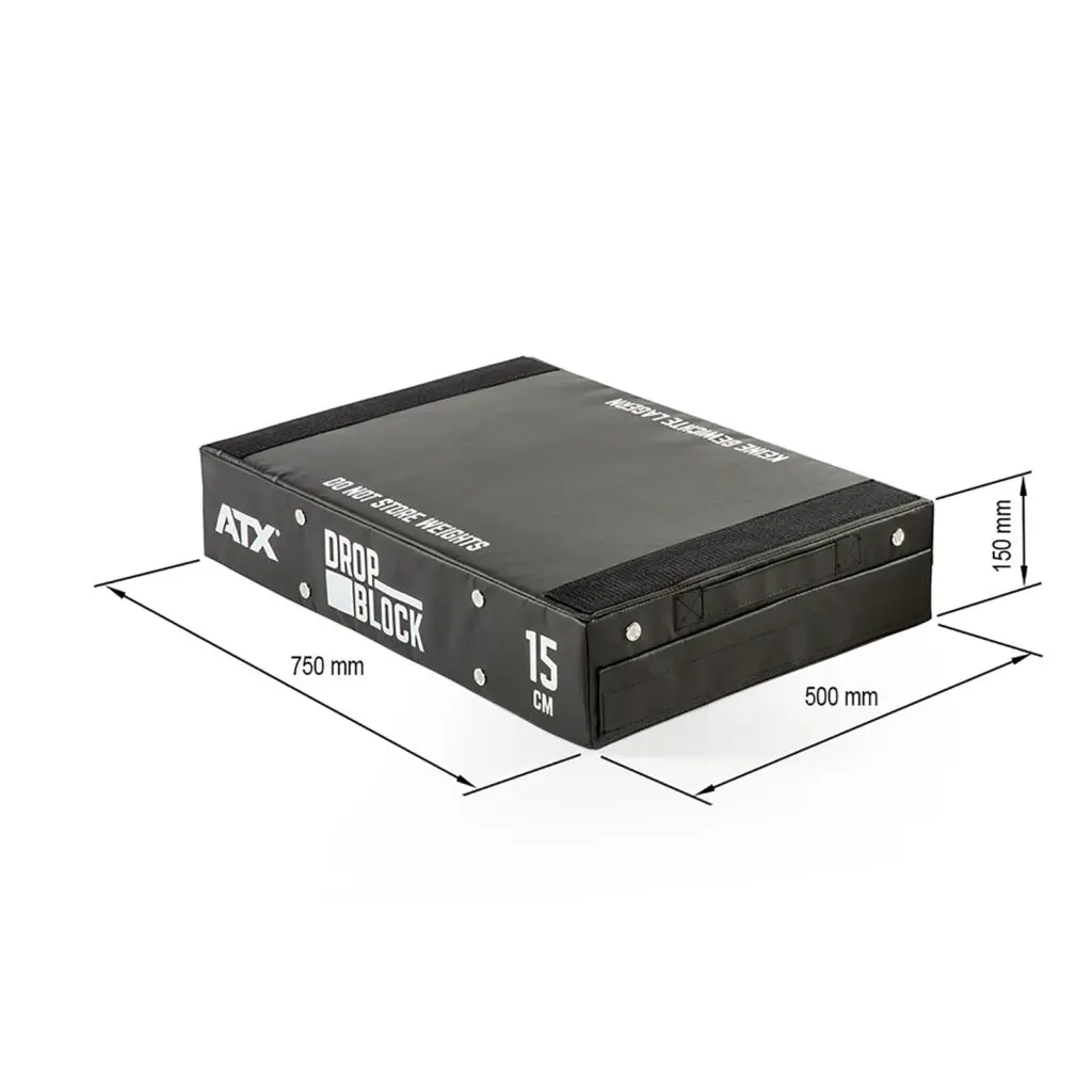 The ATX® 15 cm Soft Drop Block is a black and gray rectangular block, measuring 750 mm wide, 500 mm deep, and 150 mm tall, with reinforced edges. It features DROP BLOCK 15 CM labeled on its side.