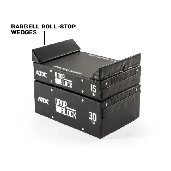 ATX® 30 cm Soft Drop Block, designed for barbell use, is stackable with a height of 15 cm and 30 cm. It features a roll-stop wedge for stability and comes in black with white text.