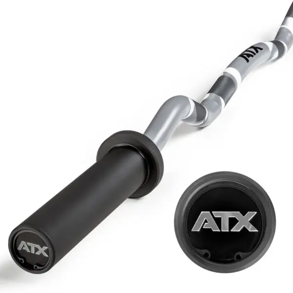 Close-up of the ATX® EZ Bar Curl Camo featuring a black sleeve and wavy, textured grip. The ATX logo is visible on both the bar end and a separate circular insert in the foreground. This product has been discontinued.