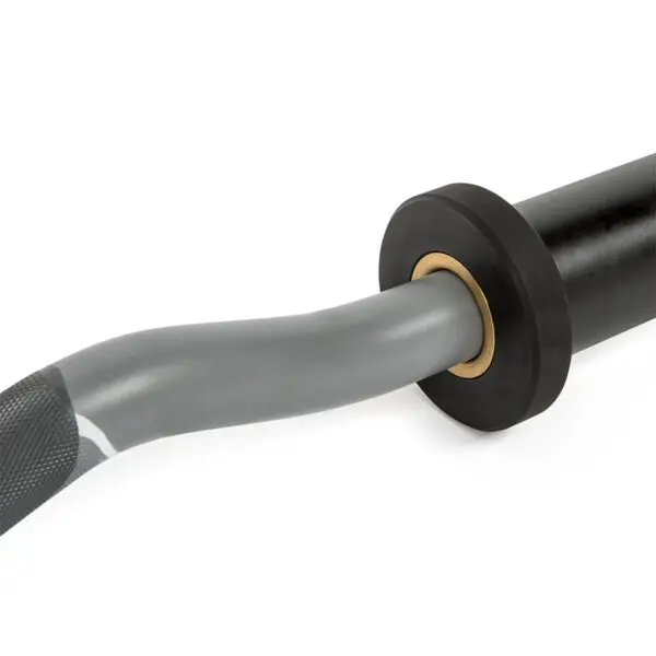 Close-up of a gray, spiraled cable attached to a black circular component with a gold ring; its textured grip resembles the ATX® EZ Bar Curl Camo, suggesting it is part of a larger device.