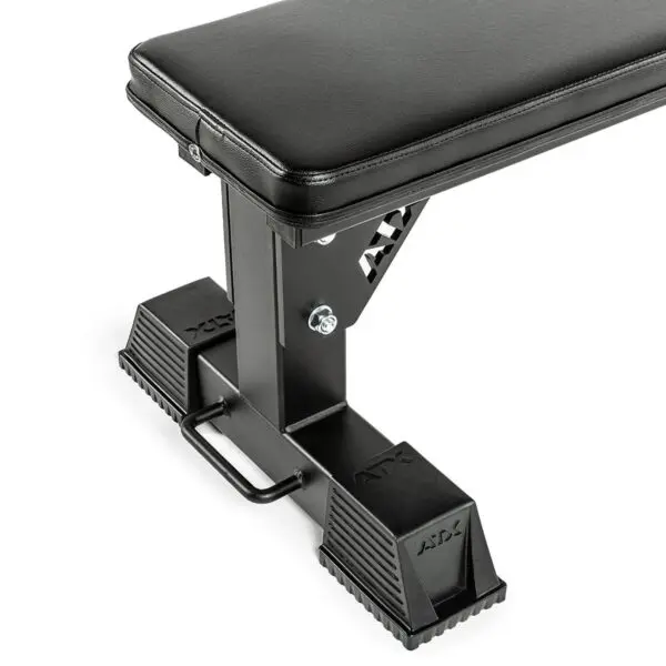 Close-up of the ATX® Flat Bench, a sleek black and silver design featuring a padded seat on a sturdy metal base with handle, displaying ATX branding.