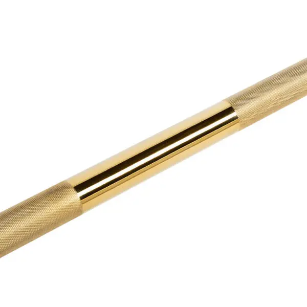 The ATX® Olympic Golden Powerlifting Bar features a gold finish with knurled grips on both ends. Its central portion is smooth and reflective, positioned diagonally against a white background.