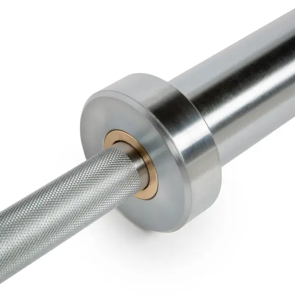 Close-up of the ATX® Olympic Womens 15kg Bar, featuring a knurled grip and smooth, shiny finish. The simple and sleek design highlights the craftsmanship of this fitness equipment.