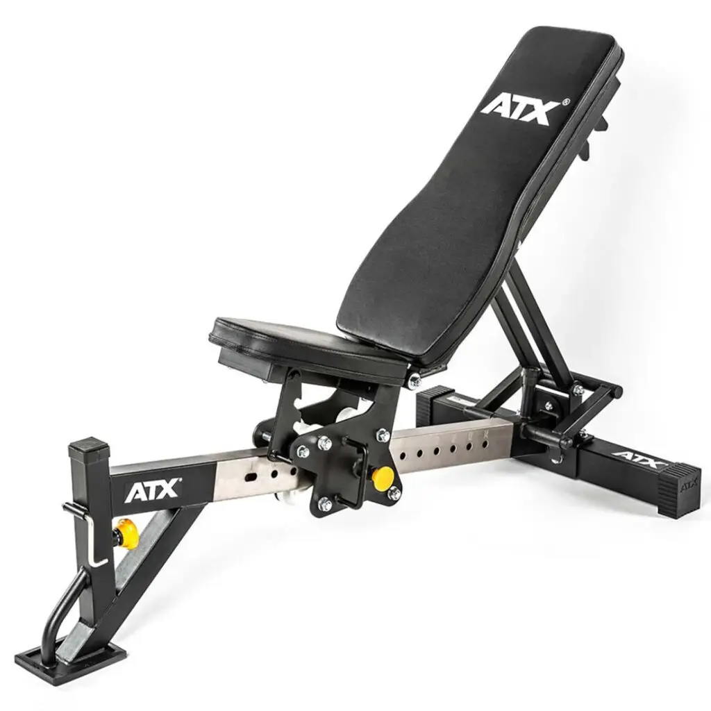 ATX® Multi Bench features black padding, a metallic frame, and an adjustable backrest and seat. It includes support bars and a foot stabilizer, branded ATX in white on the padding and frame. Ideal for gym workouts.