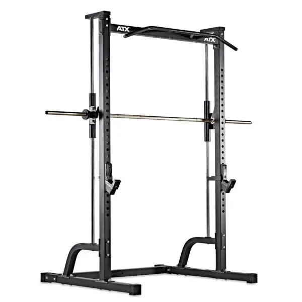 The ATX® Smith Machine Half Rack is a black, free-standing unit with adjustable barbell holders and a pull-up bar. It features multiple height settings for versatile workouts and has a logo at the top.