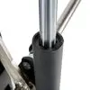 Close-up view of a sleek, shiny metallic pole inserted into a cylindrical base with a black, textured exterior; part of the ATX® Smith Machine System Plate Loaded.