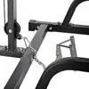 Close-up of the ATX® Smith Machine System Plate Loaded, showcasing its black metal frame with chains and a pulley system, emphasizing the connections and metal components at the lower part of the structure.
