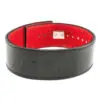 The ATX® Lever Leather Powerlifting Belt is crafted from black leather with a red interior lining and features the embossed letters ATX on the outside. It includes multiple adjustment holes and a robust metal buckle for secure fit.