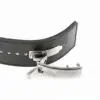 The ATX® Lever Leather Powerlifting Belt is displayed, featuring a sleek black leather design and a silver metal latch buckle. It boasts multiple adjustment holes and neatly stitched edges, with the partially open latch showcasing its modern style.