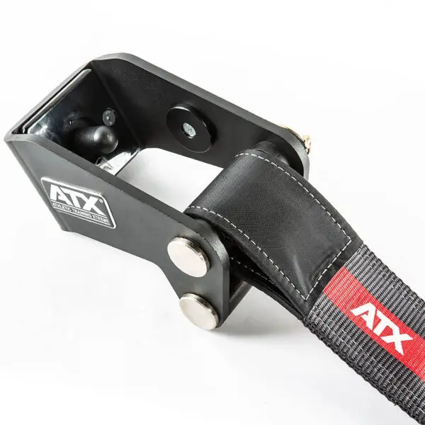 Close-up of the black ATX® Safety Strap 800, a 110 cm tensioner with metal components and a sturdy strap featuring the ATX branding. Designed for heavy-duty use, it highlights its construction and fastening mechanism.