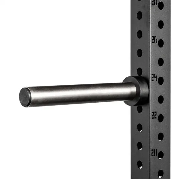 Close-up of the ATX® Weight Plate Pin extension arm. The metal arm extends horizontally from a vertical perforated support beam with numbered holes for adjustable height settings. The beam is dark, and the numbers are marked in white.