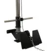 A close-up view of the ATX® Wall Mounted Lat Pulldown, showcasing its black and silver design. The exercise equipment features a pulley system with a chain and handlebar, complemented by a sturdy base and springs for resistance, making it perfect for Lat Pulldown Low Row exercises.
