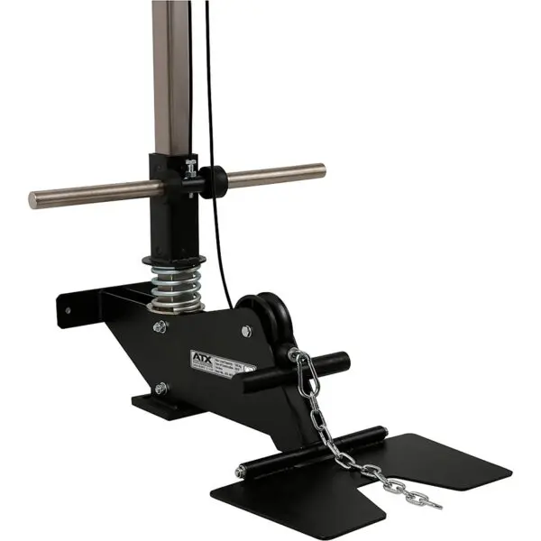 A detailed look at the ATX® Wall Mounted Lat Pulldown reveals its elegant black frame, paired with two horizontal handles, a metal spring, and a chain that connects to the base mechanism.