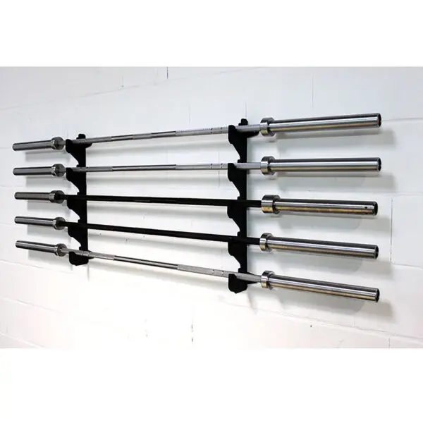 Five silver barbells are displayed horizontally using a Barbell Gun Rack - Wall Mounted, set against a white brick wall.