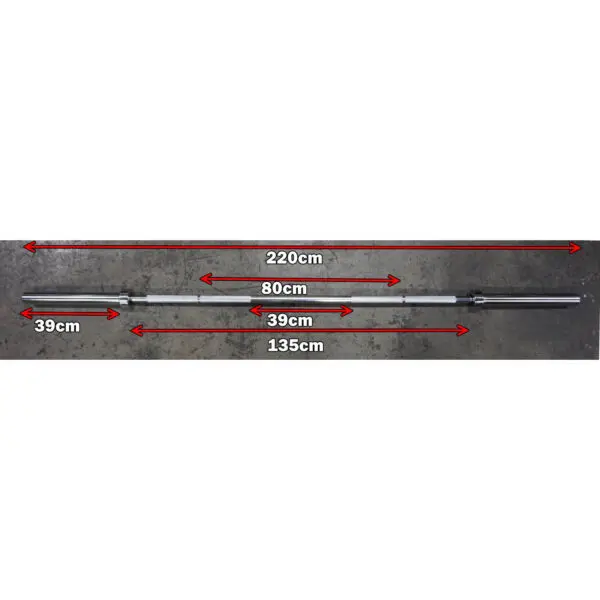 A 7ft Olympic Barbell Thrust Bearings 1000lbs lying on a concrete floor is marked in red text: total length is 220 cm, central section measures 135 cm, with two outer sections of 39 cm each, and an 80 cm gap in the middle.