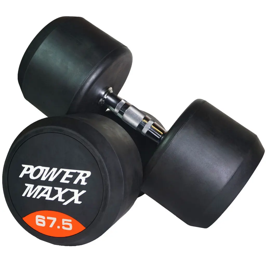 Two large black dumbbells are stacked together. One shows the label POWER MAXX 67.5 in white and orange text on its end.