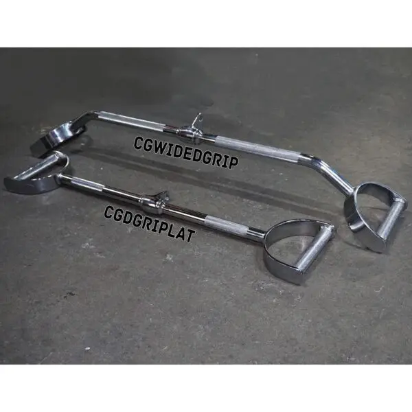 Two chrome steel gym handles with circular grips are placed on a concrete floor. One is labeled CGWIDEGRIP for the Wide D Grip Pulldown Bar, and the other CGDGRIPLAT, indicating different grip types for exercise equipment.