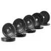 A staggered row of six black Olympic bumper weight plates, each labeled 25 KG, is displayed on a white background.