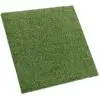 A square piece of GymFloor® RTS Turf 50x50@20mm, seen from a slightly tilted angle, features uniform grass texture and neatly cut edges.