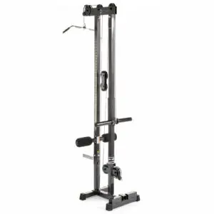 The Ironmaster Cable Tower Attachment V2 is a tall, black strength training machine with pulleys and cables. It includes a central column and attachments for exercises like lat pull-downs and seated rows, all set on a sturdy black base.