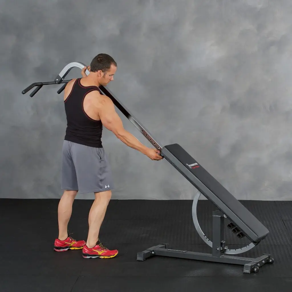 Man docking Ironmaster Chin Up attachment into a Super Bench