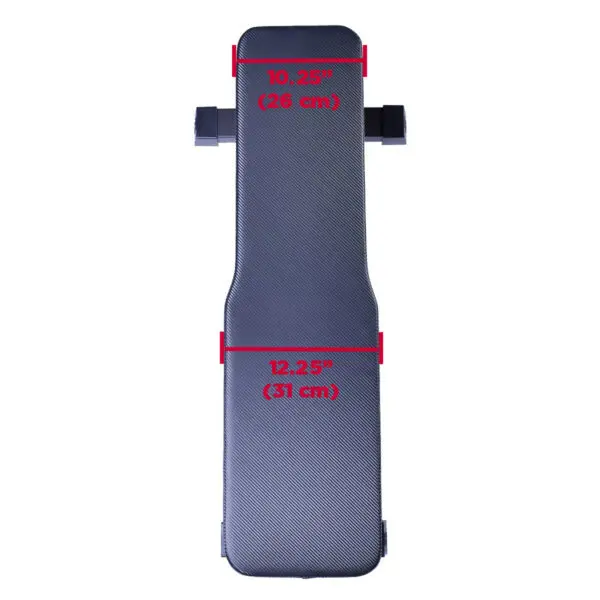 Top view of the Ironmaster Hybrid Bench Pad in black with a textured surface, showing red-marked measurements: top section at 10.25 inches (26 cm) and bottom at 12.25 inches (31 cm), featuring stylish functional side extensions.