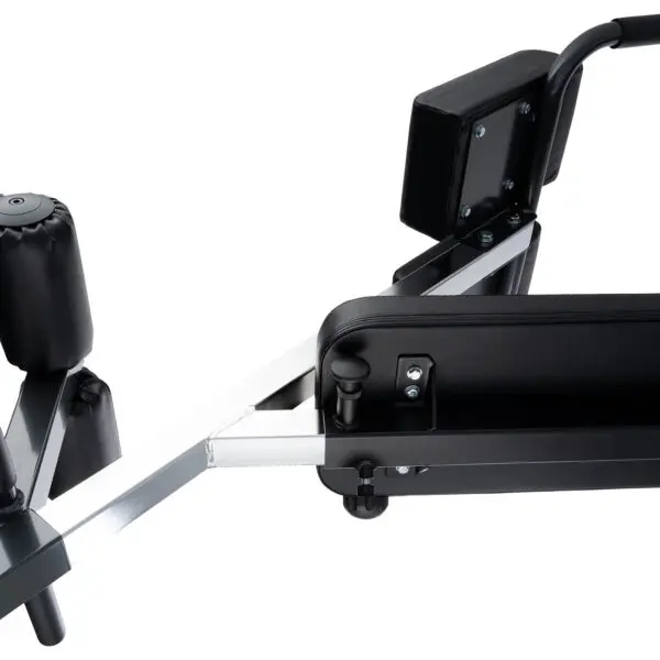 The Ironmaster Hyper Core Attachment, shown in a close-up, is a black padded exercise machine with a sturdy metal frame. It features adjustable components and cushioned areas for comfort, ideal for strength training or flexibility exercises.