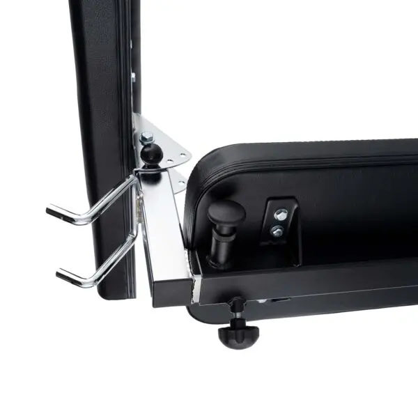 Close-up of the Ironmaster Preacher Pads black adjustable weight bench mechanism, showcasing the metal frame, adjustment knobs, and securing hooks. The design features sleek silver accents and a robust construction.