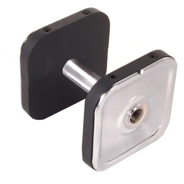 Close-up of the Ironmaster Heavy Handle Kit, a modern, square-shaped adjustable dumbbell with a metallic handle and black weights. The sleek, flat surfaces enhance its contemporary design, angled on a white background.