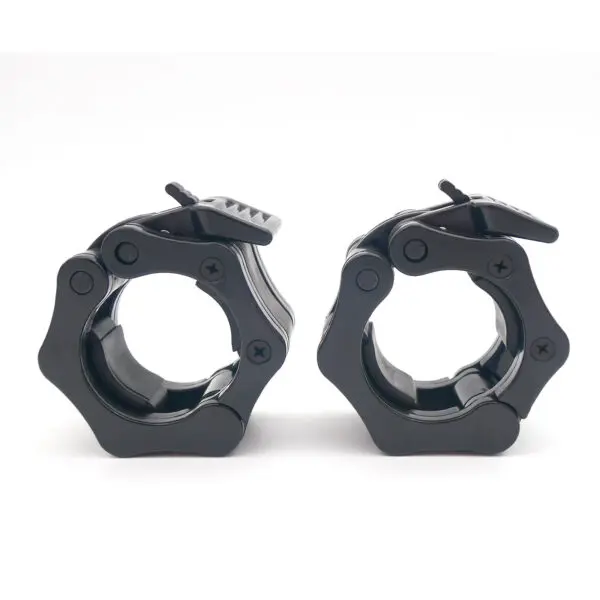 A pair of black Olympic Lock Jaw Collars, made of plastic with locking mechanisms to secure weight plates on a barbell, featuring an easy lever for attachment and release. They are displayed side by side on a white background.