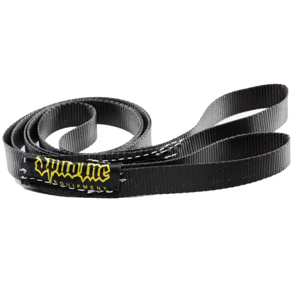 A coiled black climbing sling, the Spud Inc Bow Tie Tail, features sewn loops at both ends. It bears a yellow and white Climb Me Equipment logo and has a durable texture suited for climbing activities.