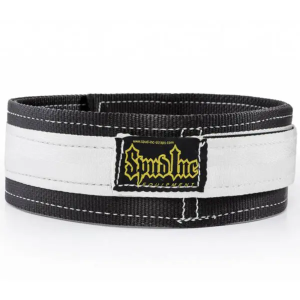The Spud Inc 2 Ply Deadlift Belt is black and white with yellow Spud Inc branding. It features a sturdy design, reinforced stitching, and thickness ideal for strength training.