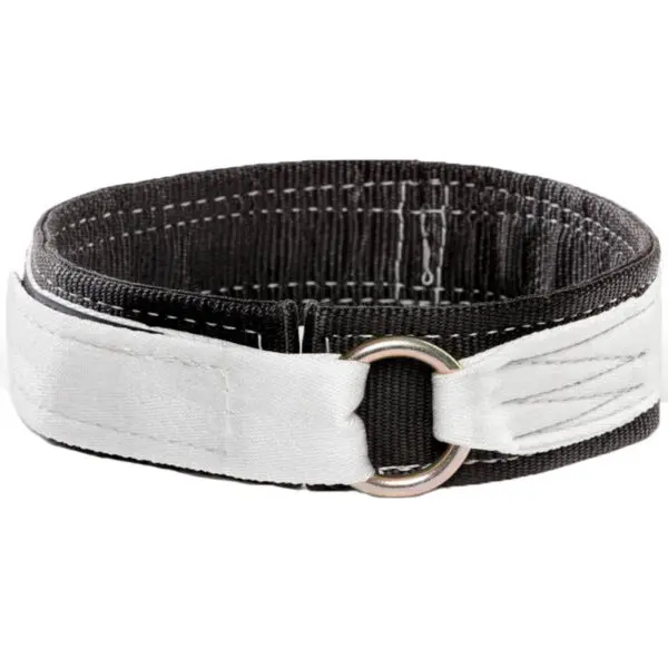 The martial arts belt, featuring a silver ring buckle and visible stitching, is coiled neatly on a white background, reflecting the craftsmanship of Spud Elbow Sleeves.