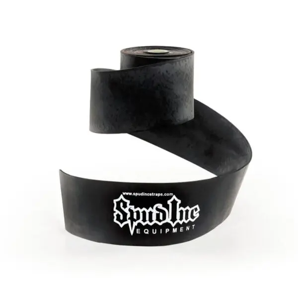 A coiled Spud Inc Elephant Band Black, featuring the logo Spud Inc Equipment, has one end standing upright and the other lying flat.