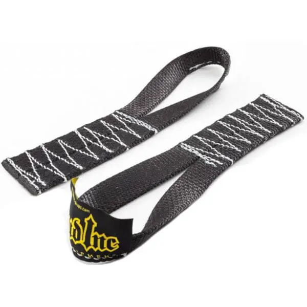 A pair of black lifting straps with white stitching and a yellow logo on the patch, called the Spud Magic Carpet Sled, designed for weightlifting with loops to secure a firm grip.