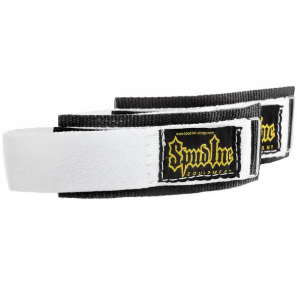 Two Spud Velcro Wrist Wraps in black and white feature a rugged design with Spud Inc. Equipment branding, ideal for weightlifting or strength training.