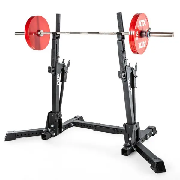 The ATX® Competition Combo Rack, featuring red weightlifting barbells, is mounted on a black adjustable squat rack suitable for various exercises, set against a white background.