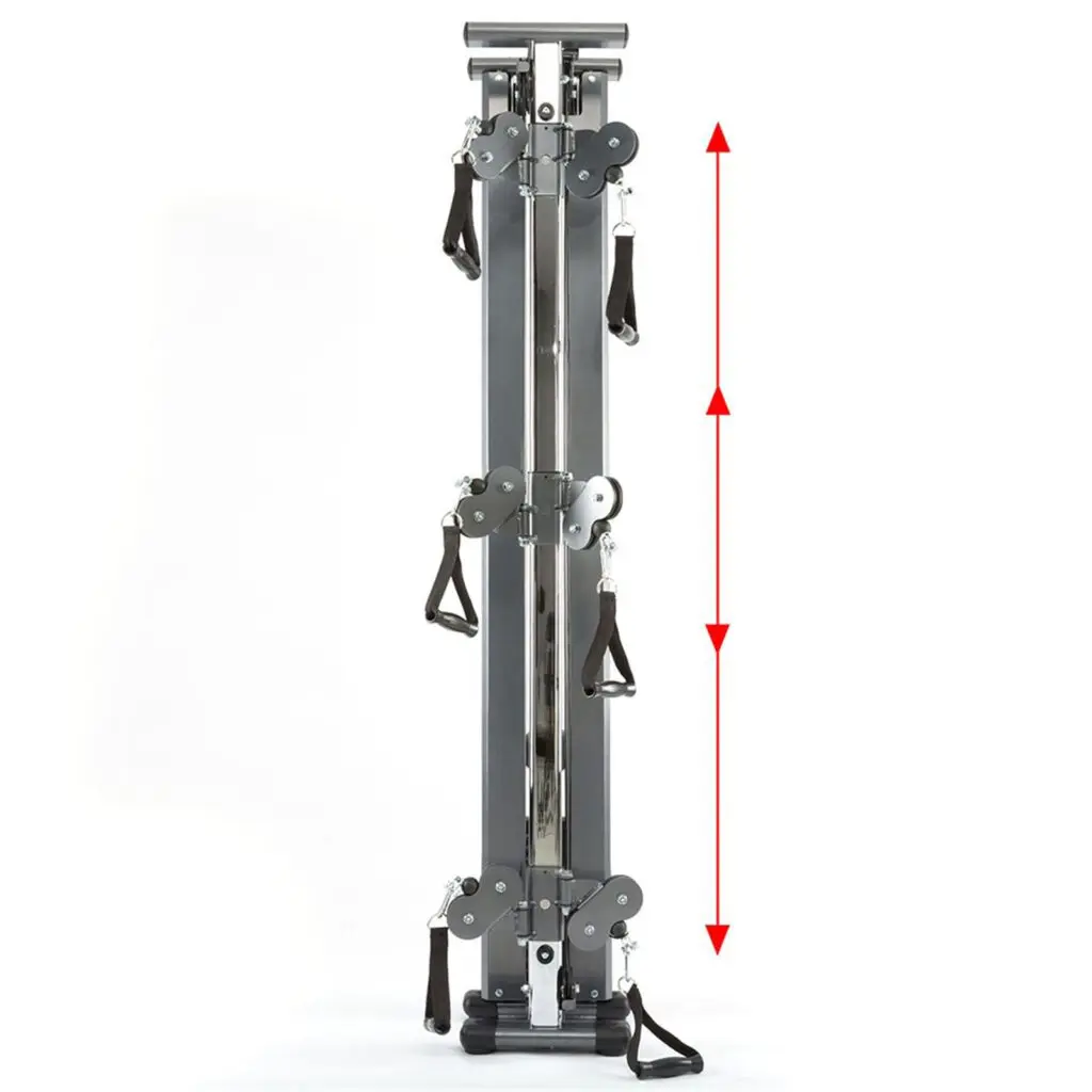 A vertical cable exercise machine with pulleys and handles on both sides, featuring a central rail with sliders for upper body workouts. The entire setup is displayed against a plain background, with red arrows indicating the height.