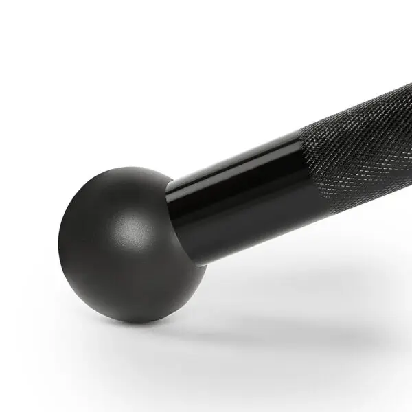 The ATX® Lat Bar Blackline is shown in close-up, displaying its black, textured hand grip with a rounded end, resting on a white surface.