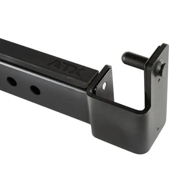 Close-up of a black metal ATX® Spotter Bars 75cm with an L-shaped hook and protruding peg, designed to hold weight bars. It features multiple adjustment holes and ATX markings on the side.