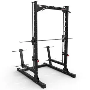 A black power rack with a pull-up bar and barbell resting on adjustable hooks is shown. It has safety catch bars and plate storage pegs on each side. The rack is standing on a flat surface, ready for weightlifting exercises.