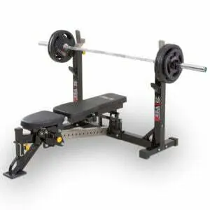 A weight bench with an adjustable back and attached barbell rack, perfect for those consulting a bench press buying guide. It features a loaded barbell with weights on each side, predominantly black design, and sturdy metal frame adorned with visible brand logos.