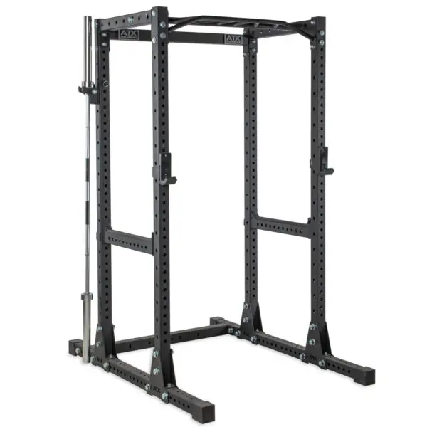 A black ATX® Bar Holder power rack includes adjustable holes for safety bars, a top pull-up bar, and a side barbell holder. The structure sits on a flat surface.