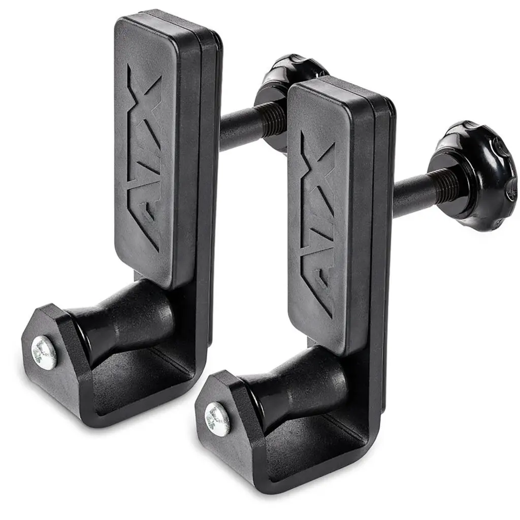 Two ATX® Roller J-Hooks Universal, black clamp-style exercise barbell holders, featuring adjustable knobs and an embossed ATX logo. They have a sturdy rectangular design with a screw for attachment.